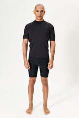 Fototapeta premium Men's black short sleeved wetsuit top full body shot