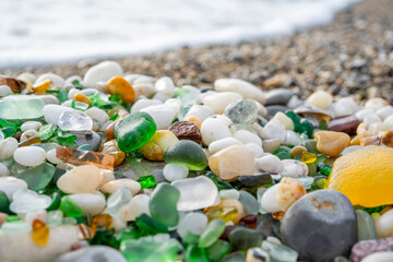 Glass and rocks moulded by the sea