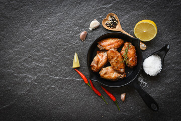 Baked chicken wings with sauce and herbs and spices cooking thai asian food rosemary chicken grilled.