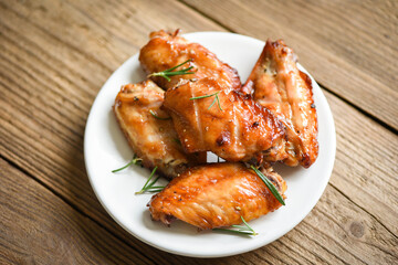 Baked chicken wings with sauce herbs and spices cooking thai asian food rosemary chicken grilled.