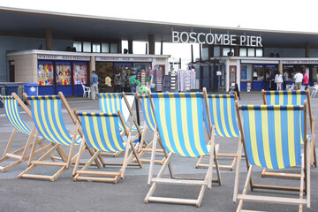 Deck chairs on Boscombe Pier in Boscombe, Dorset in the UK