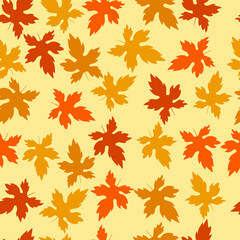 Naklejka na ściany i meble Seamless pattern of yellow and orange maple leaves on a yellow background