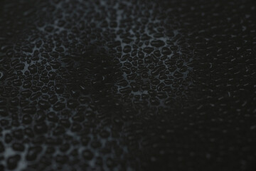 rough grainy textured background with shades of gray as a liquid on a metal surface in black and white backdrop