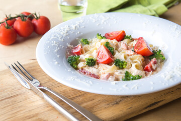 Italian Pasta or spaghetti with tomato  and bacon. Pasta carbonara.