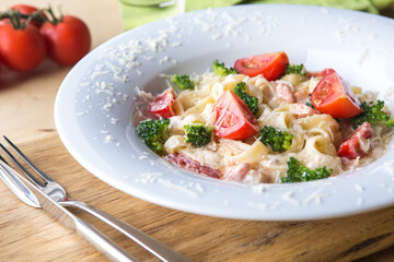 Italian Pasta or spaghetti with tomato  and bacon. Pasta carbonara.