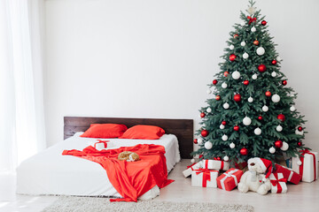 Christmas tree with gift decor bedroom with bed new year feast winter background