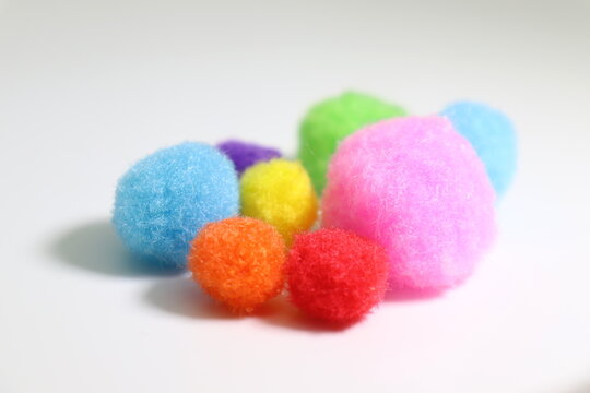 
soft pom-poms with small vibrant colors