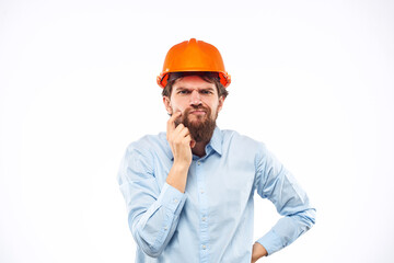 engineer in orange safety helmet in construction emotions professional lifestyle