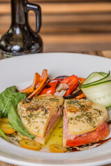 stuffed provolone accompanied by greens
