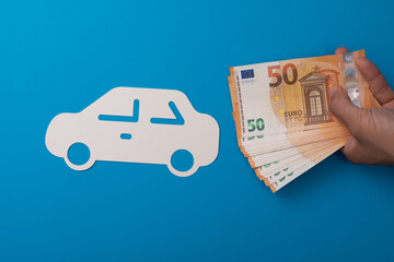 Car and insurance concept money.
