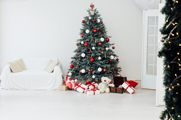 Christmas tree pine with red gifts decor new year feast winter background