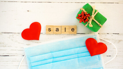 sale.words from wooden cubes with letters photo