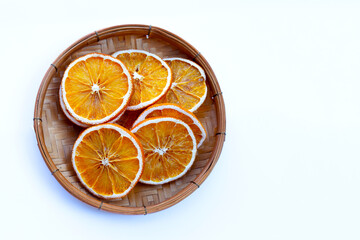 Dried orange slices on white background.