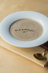 Vegetarian white soup cream of cauliflower. Vegetarian healthy food concept. Top view. Copy space.