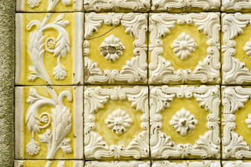 detail of relief tile, azulejos,  on one of the 800 tiled facades identified in Ovar, Aveiro district, Portugal
