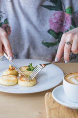 Sweet Cottage cheese pancakes on plate. Russian syrniki, ricotta fritters or curd fritters.