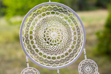 Handmade dream catcher with feathers threads and beads rope hanging