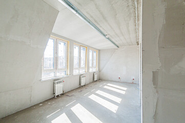 Russia, Moscow- April 17, 2020: interior room apartment rough repair for self-finishing. interior decoration, bare walls of the premises, stage of construction