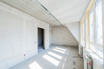 Russia, Moscow- April 17, 2020: interior room apartment rough repair for self-finishing. interior decoration, bare walls of the premises, stage of construction