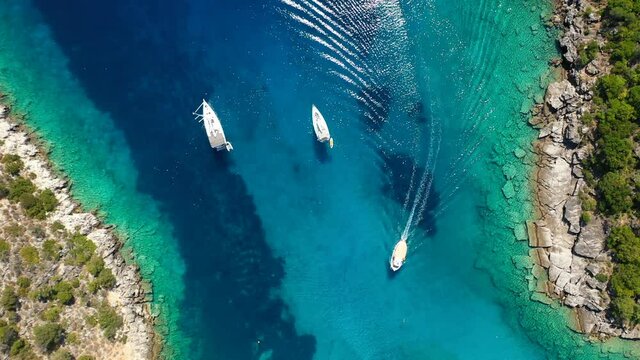 Aerial drone video of turquoise paradise sandy beach and bay of Filatro a safe sail boat anchorage in Ithaki or Ithaca island, Ionian, Greece