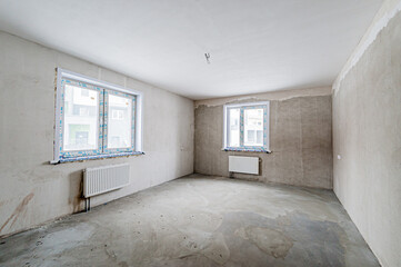 Russia, Moscow- April 17, 2020: interior room apartment rough repair for self-finishing. interior decoration, bare walls of the premises, stage of construction