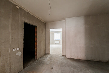 Russia, Moscow- April 17, 2020: interior room apartment rough repair for self-finishing. interior decoration, bare walls of the premises, stage of construction
