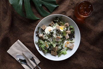 caesar salad appetizer on wooden background
