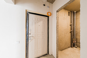 Russia, Moscow- April 17, 2020: interior room apartment rough repair for self-finishing. interior decoration, bare walls of the premises, stage of construction