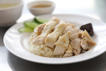 Thai food gourmet steamed chicken with rice khao mun kai in wood background