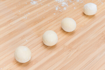 Asian women are making glutinous rice balls