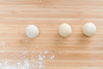 Asian women are making glutinous rice balls