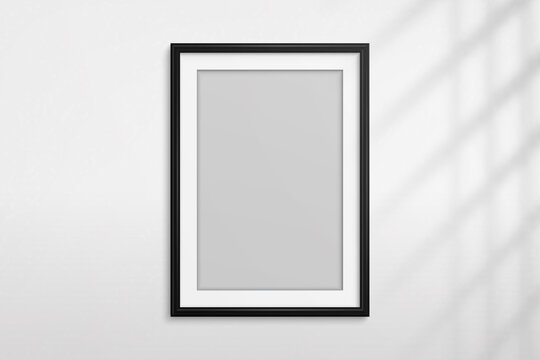 Mockup black frame photo. Shadow on wall. Mock up artwork picture framed. Vertical boarder. Empty board a4 photoframe. Modern stylish 3d border for design prints poster, blank, painting image. Vector