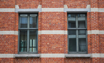 the windows of a brick building