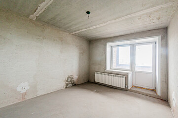 Russia, Moscow- April 17, 2020: interior room apartment rough repair for self-finishing. interior decoration, bare walls of the premises, stage of construction
