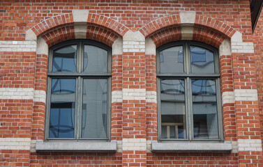 the windows of a brick building