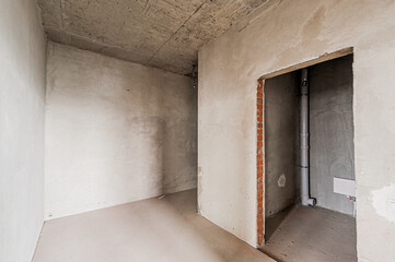 Russia, Moscow- April 17, 2020: interior room apartment rough repair for self-finishing. interior decoration, bare walls of the premises, stage of construction