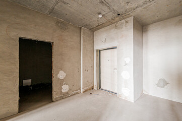 Russia, Moscow- April 17, 2020: interior room apartment rough repair for self-finishing. interior decoration, bare walls of the premises, stage of construction