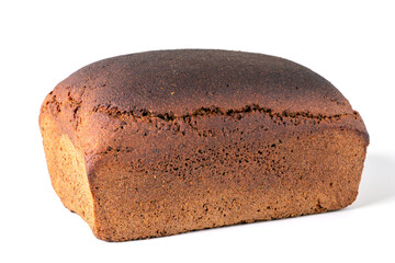 A loaf of black rye bread, side view. Isolated on white background. Close-up. Top-side view.