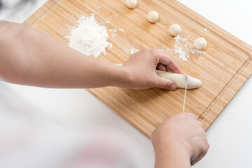 Asian women are making glutinous rice balls
