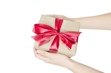 gift box with beautiful red bows in women's hands on white background isolated