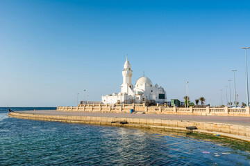 A white  Al Rahmah mosque located at Jeddah Corniche, 30 km coastal resort area of Jeddah city with coastal road, recreation areas, pavilions and civic sculptures