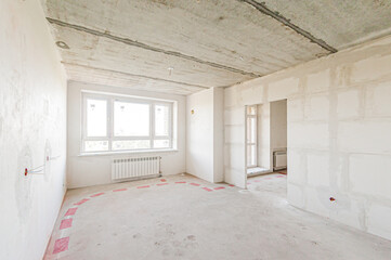 Russia, Moscow- April 17, 2020: interior room apartment rough repair for self-finishing. interior decoration, bare walls of the premises, stage of construction