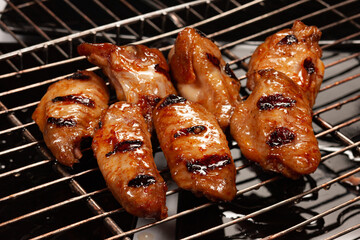 grilled chicken wings on grill