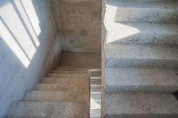 Fototapeta na wymiar Rough staircase with reinforced concrete structure