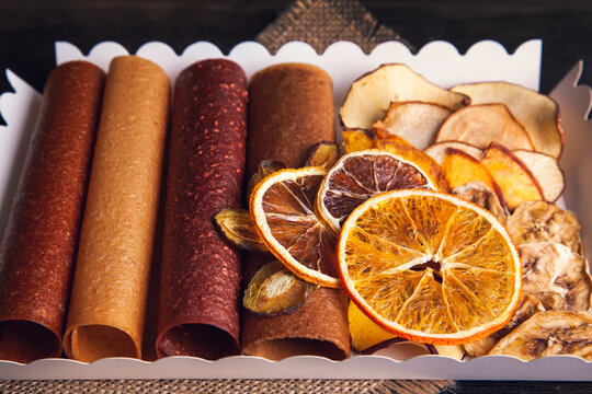 Sweet fruit snacks in a package - pastilles and dried fruit.