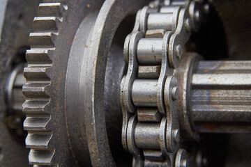 gear mechanism,close up of a reducer with a toothed connection on a chain
