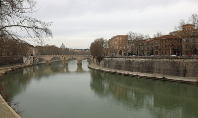 Fototapeta premium river Tiber that crosses the city of Rome is at the bottom of th