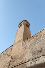 Obraz premium The bell tower of the Monastery of the Flagellation on the Via Dolorosa Street in the old city of Jerusalem in Israel