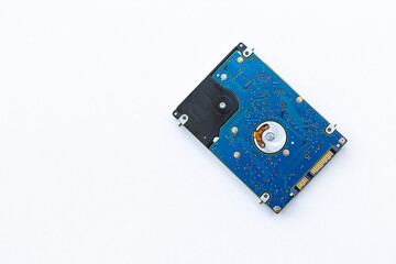Old hard Disk Drive HDD on White Background, computer data storagedevice for stores and retrieves digital data