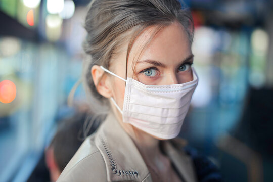 Portrait Of Girl With Mask On A Bus